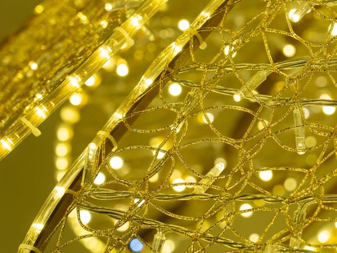 Close-up of a gold lit sculptural motif