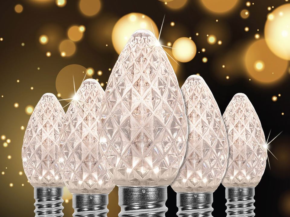 Close-up of faceted warm white C9 LED bulbs