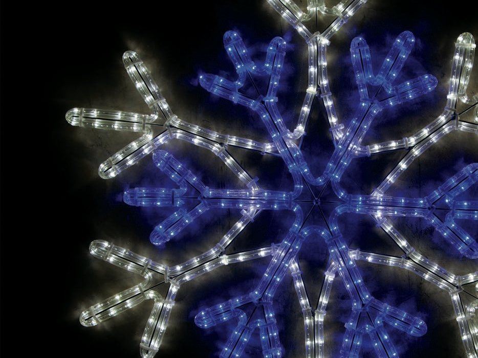 A blue and white lit snowflake